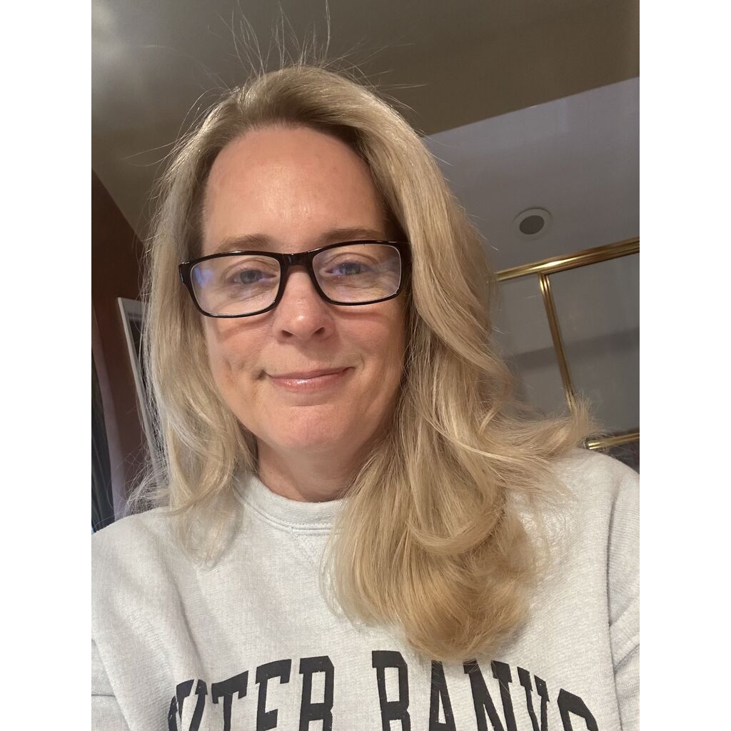 avatar for Gina Moore